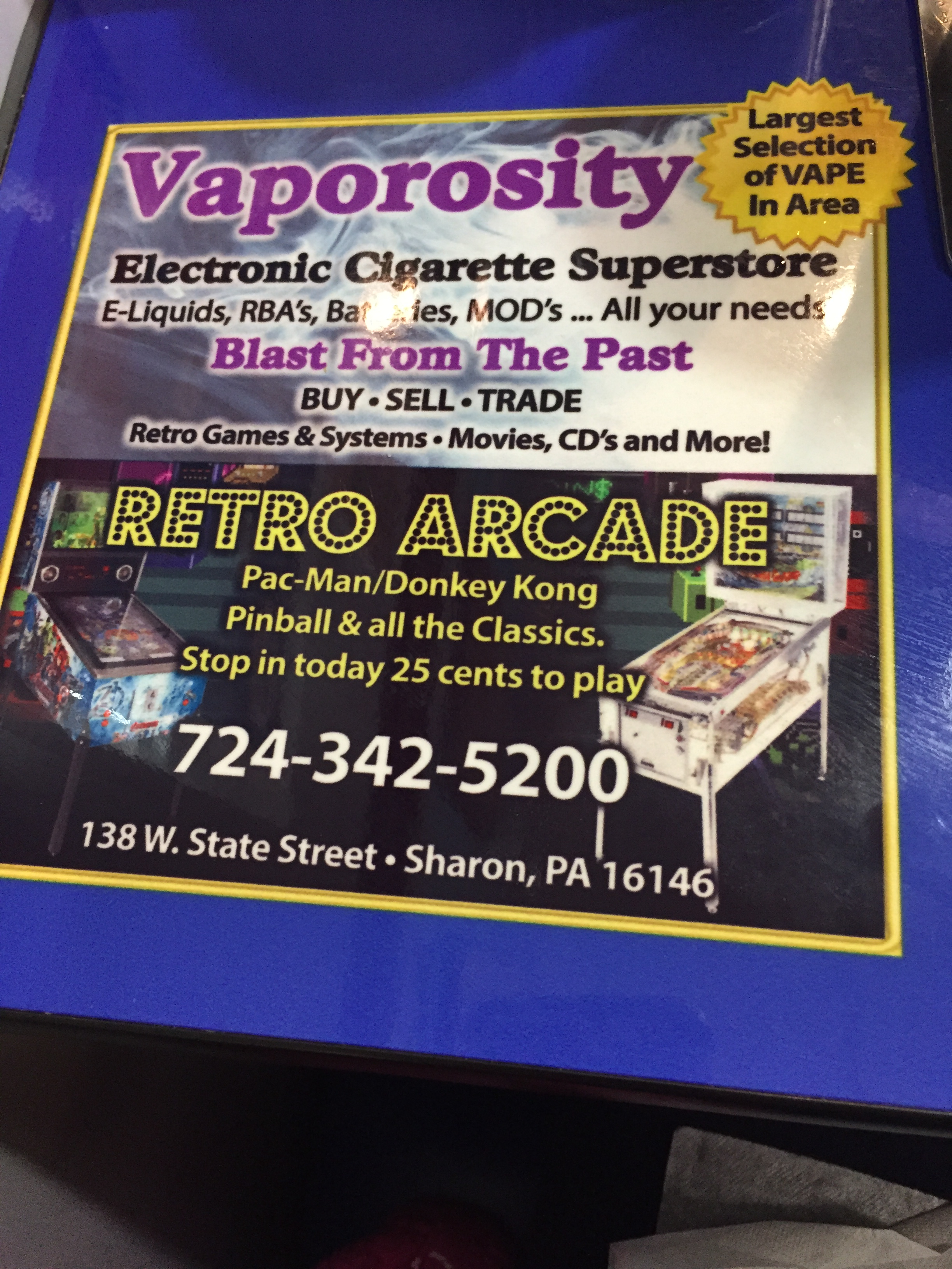 Ad for Vape Shop beside an ad for a 