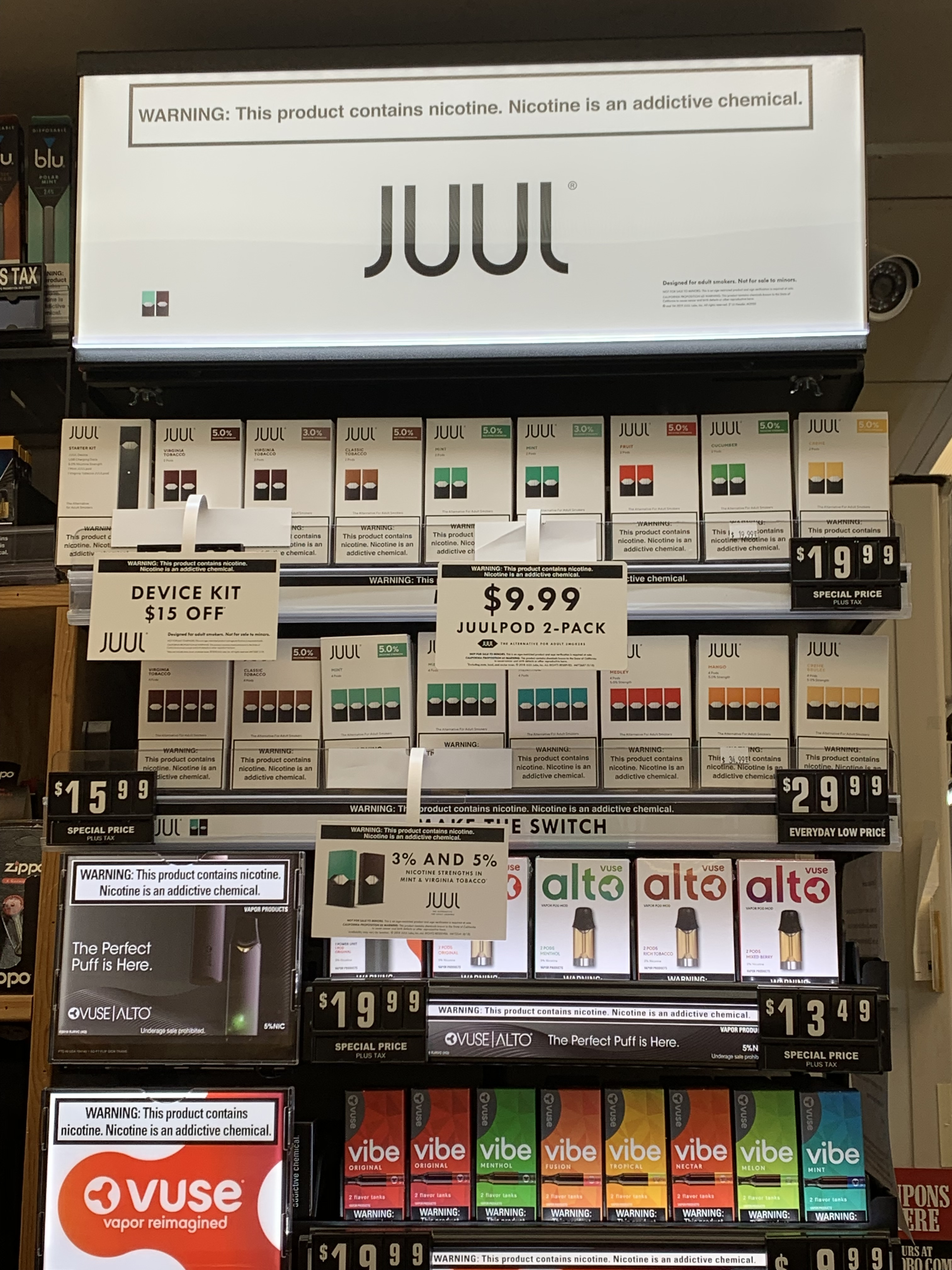 Display of Juul, Vuse Alto, and Ciro e-cigarettes in various flavors 