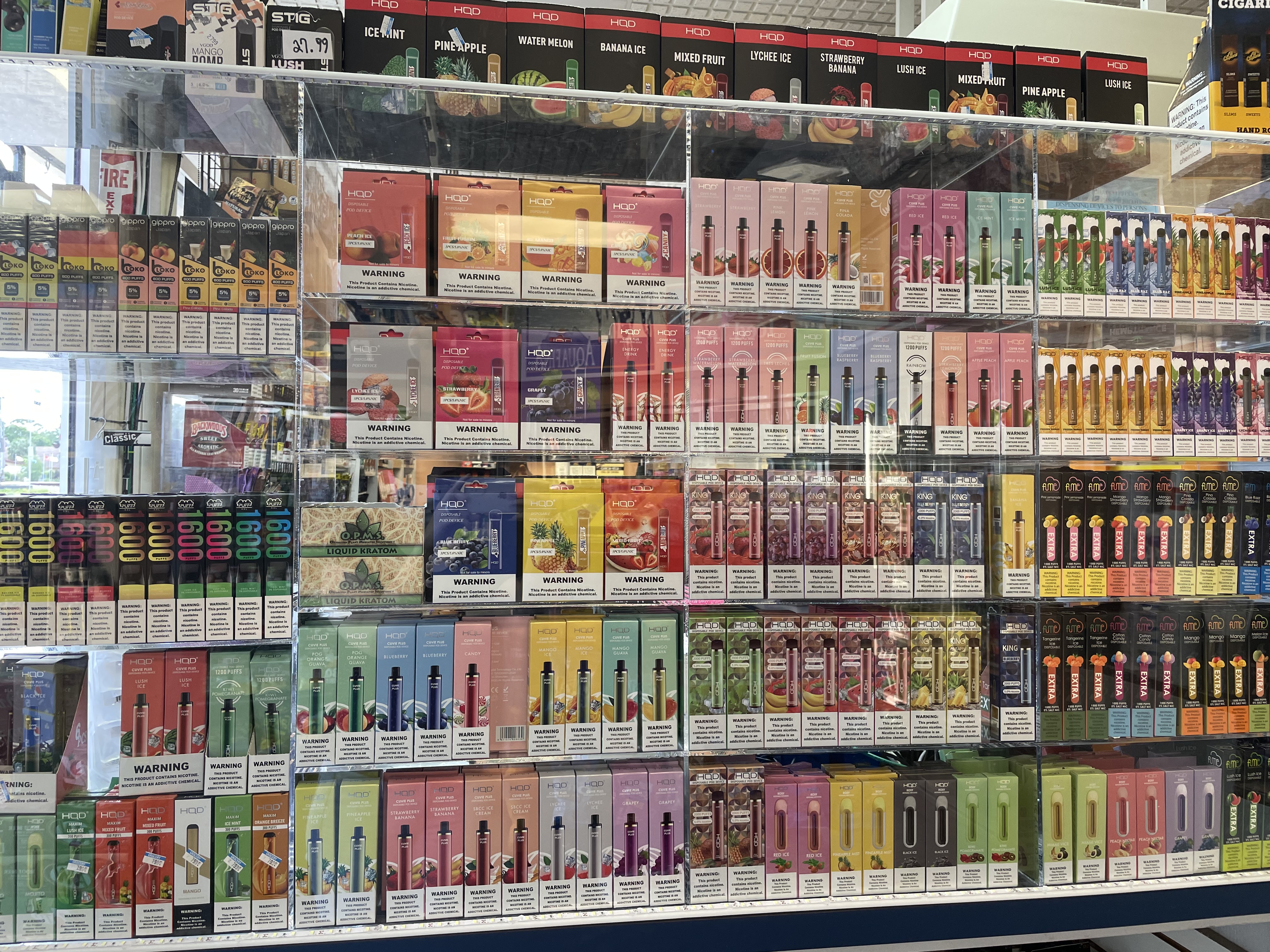 wall of flavored disposable e-cigarettes