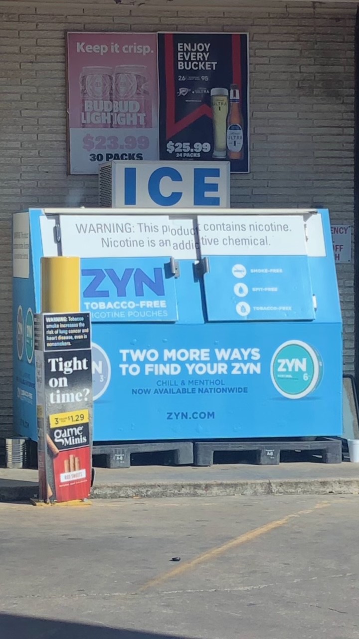 ice chest outside a tobacco retailer covered in a Zyn advertisement