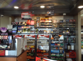 Cigarette products on display: smokeless, e-cigarette and all kinds of brands.