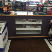 Local popular gas station. note the ice cream machine and tobacco display right at child eye level