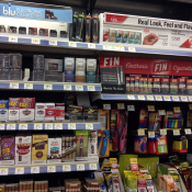 E-cigarette and cigar displays within shelving unit