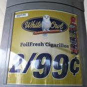 WhiteOwl Cigar signage at gas pump