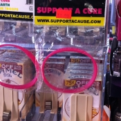 Support the Cure Bracelet Next to Camel Cigarettes