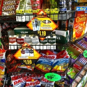 Cigarettes and Cigarillos Near Candy and Cereal