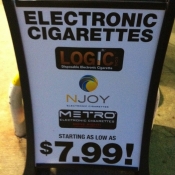 3D E-cigarette sign at gas pump; rural gas station in Hillsborough, NC