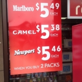 Exterior cigarette advertisements with price