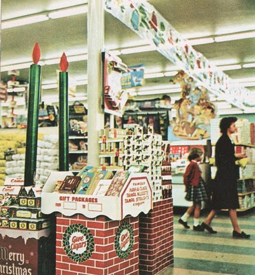 early to mid 1960s in-store holiday display containing cigar and cigarette gift boxes 