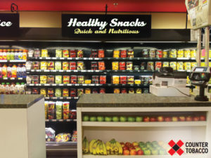 retail store with fresh produce behind the counter instead of tobacco products 