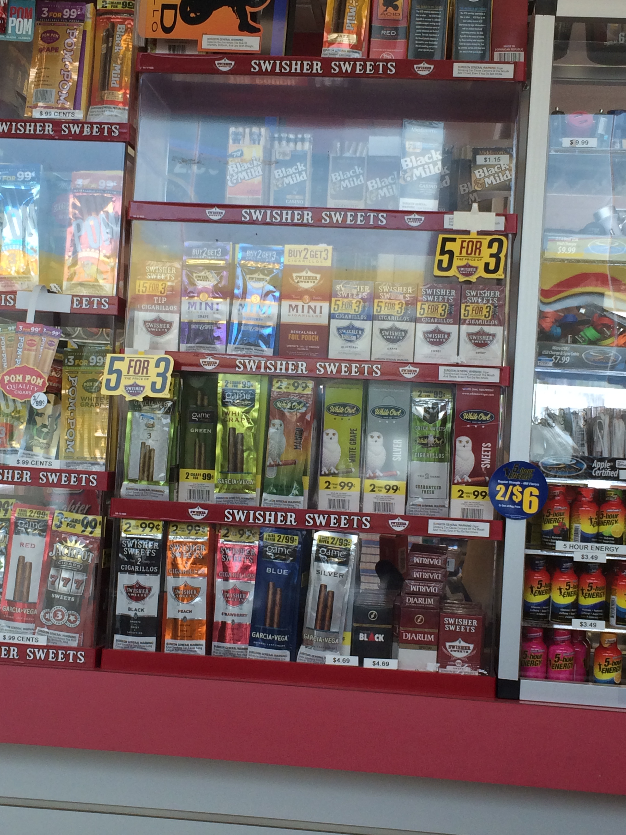 display of little cigars and cigarillos with various flavors, including "concept" flavors 