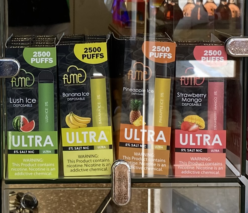 display of e-cigarettes with flavors like "lush ice" and "banana ice"