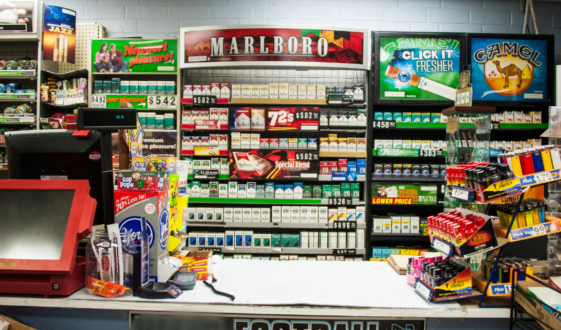 display of tobacco products behind a counter